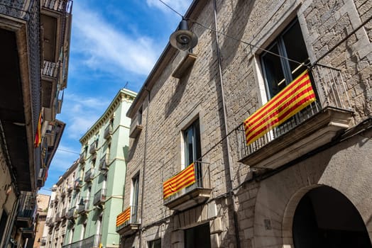 Historic architecture and Catalan Flags in Girona, Spain