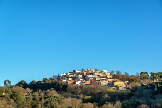 Modern neighborhood on a tree covered hill in Girona, Spain