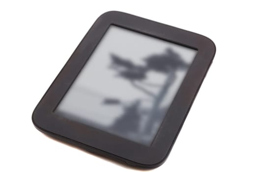 black ebook reader or tablet on white background