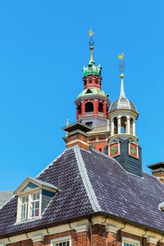 picture of the tops of the Old Weigh House and the Grosse Kirche in Leer, Ostfriesland, Germany