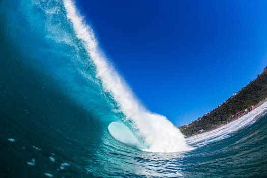 Wave crashing hollow blue water ocean power