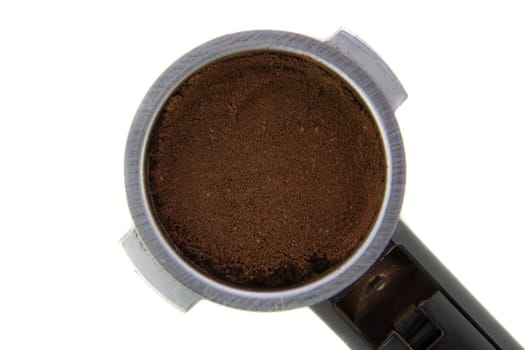 Espresso Maker Filter Holder with ground coffee on white background