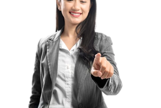 Young asian business woman touch something with her finger hand standing isolated over white background