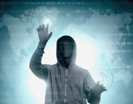 Hacker in black hoodie touching virtual screen with binary code and world map background
