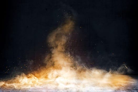 Room with concrete floor and smoke with fire sparks with dark wall background