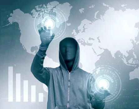 Hacker in black hoodie touching virtual screen with chart bar and world map background