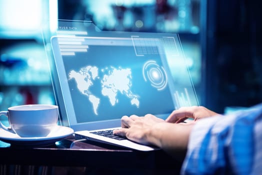 Businessman working using laptop with virtual screen display the server data, worldwide map, binary and chart bar with coffee on the table at office room background. Cyber security and privacy. General Data Protection Regulation (GDPR) concept