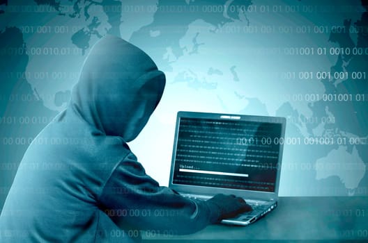 Hacker in black hoodie using laptop on the desk to hacking system with binary code and upload the malware with world map background