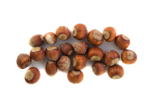 Group of natural hazelnuts on white background