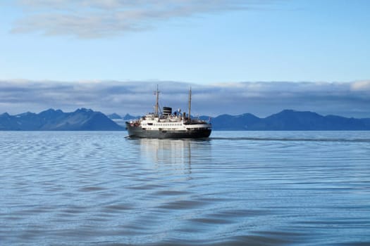 Hurtigruten post steamer at Grønfjorden, Svalbard coast