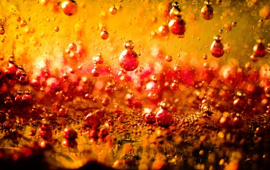 Colorful bubbly liquid in with unique shapes and pattern. Artistic abstract design. - image
