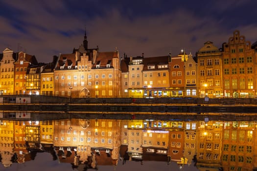 Gdansk night view, Motlawa river and Old Town houses, Poland.