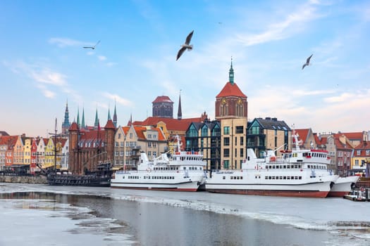 Gdansk sights and ships in the Motlawa, winter view.