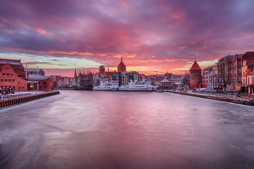 Gdansk sunset on the Motlawa river, Poland, winter view.