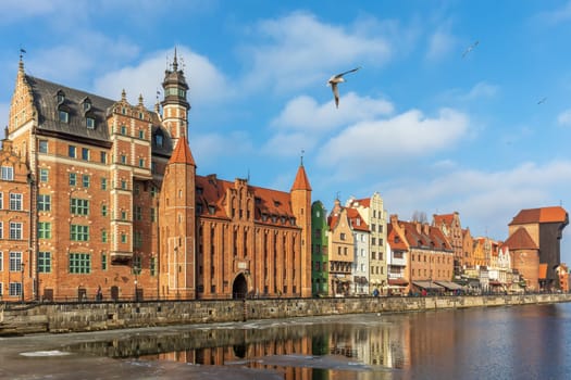 Mariacka Gate, beautiful gate in Gdansk in front of the Motlawa.