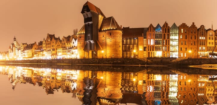 Gdansk night panorama, view on Zuraw port crane, Poland.