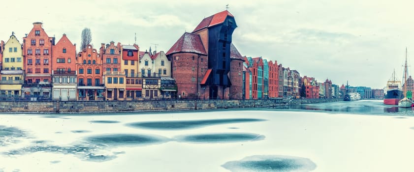 Gdansk winter panorama, view on Zuraw Port Crane from the Motlawa, Poland.