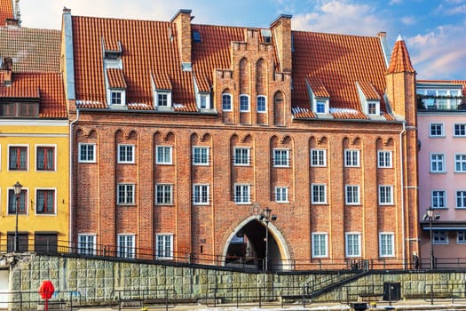Chlebnicka Gate, a gothic town gate in Gdansk, Poland, sunny day view.