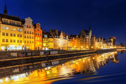 Gdansk night cobalt sky, view on the buldings by the Motlawa.