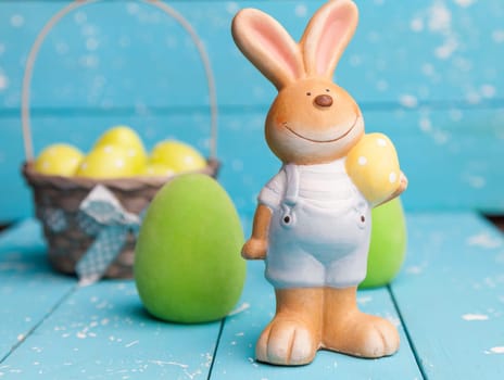 Traditional Easter holiday bunny and eggs on white background