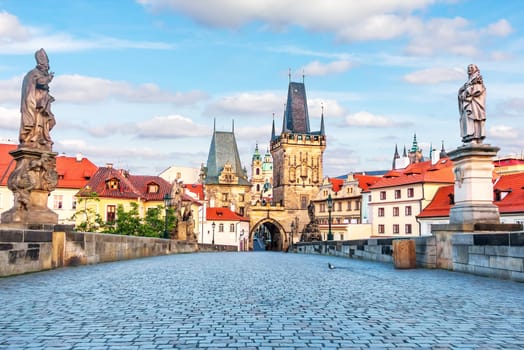 Statues of Charles Bridge and the Mala Strana Bridge Towers, summer view.