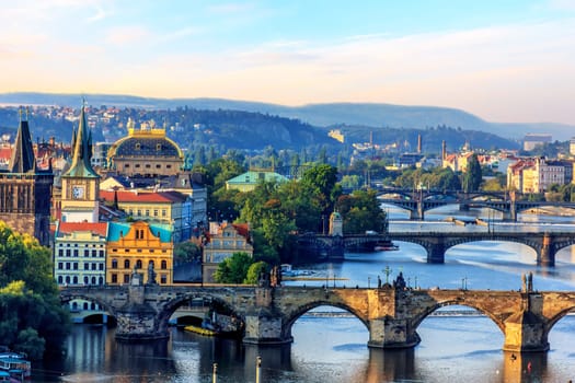 Charles Bridge, Old Town Tower and National theatre, Prague.