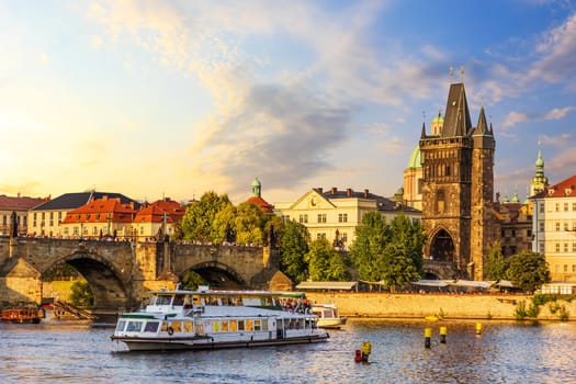 A ship in the Vltava near the Charles Bridge and Old Town Bridge Tower, Prague.