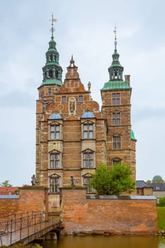 Rosenborg Castle in Copenhagen. Rosenborg castle on cloudy summer day in Copenhagen, Denmark. Rosenborg Slot castle in the Danish capital Copenhagen.