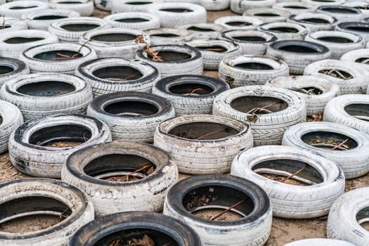 Budva, Montenegro - April 2018 : Pile of old discarded tires left on the ground