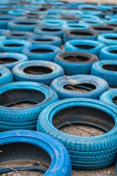 Budva, Montenegro - April 2018 : Pile of old discarded tyres left on the ground