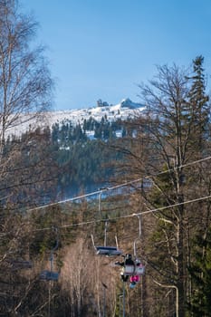 Szklarska Poreba, Poland - February 2019 : Ski lift up to the top of the Szrenica mountain in winter resort town, Karkonosze mountains