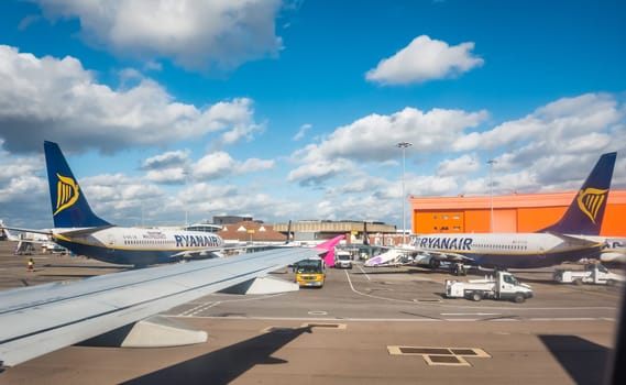 Luton, England - September 2018 : Ryanair planes waiting for passengers on a Stansted airport, UK