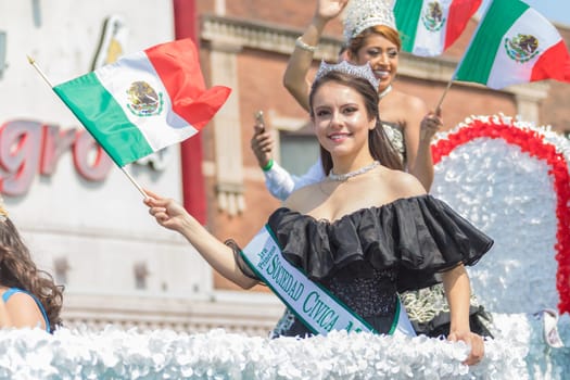 Chicago, Illinois , USA - September 10, 2017, The 26th Street Mexican Independence Parade celebrates Mexican Independence from Spain with floats, mariachi bands and dancing in the streets.