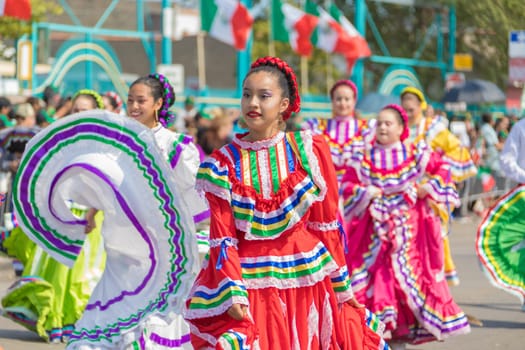 Chicago, Illinois , USA - September 10, 2017, The 26th Street Mexican Independence Parade celebrates Mexican Independence from Spain with floats, mariachi bands and dancing in the streets.