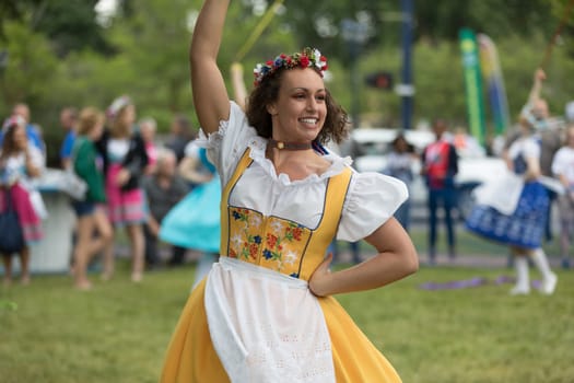 Frankenmuth, Michigan, USA - June 10, 2018 Members from the Frankenmuth dance center perform the maypole dance during the Bavarian Festival.