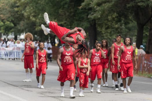 Chicago , Illinois, USA -  August 12, 2017: Group of athletes displaying acrobatic stuns