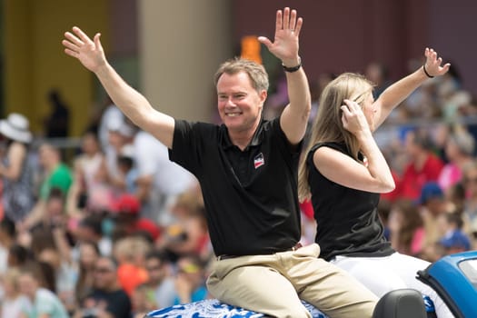 Indianapolis, Indiana, USA - May 26, 2018,  The Mayor Joe Hogsett  on a car going down the road at the Indy 500 Parade