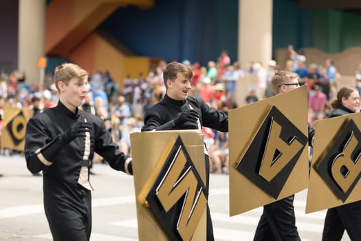 Indianapolis, Indiana, USA - May 26, 2018, Members of the black and gold marching band   at the Indy 500 Parade
