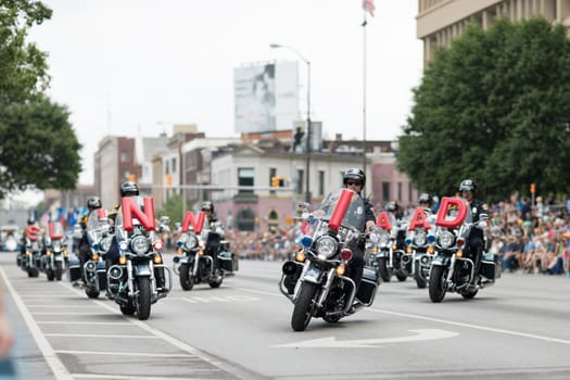 Indianapolis, Indiana, USA - May 26, 2018, The Indianapolis Metropolitan Police Motorcycle Drill Team performs at Indy 500 Parade