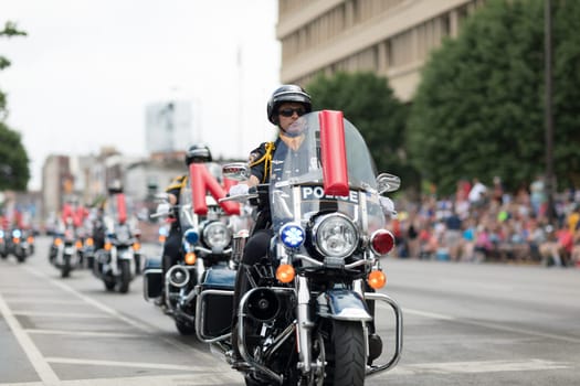 Indianapolis, Indiana, USA - May 26, 2018, The Indianapolis Metropolitan Police Motorcycle Drill Team performs at Indy 500 Parade
