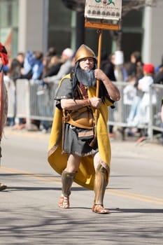 Chicago, Illinois, USA - April 29, 2018 Greek man dress up as spartan at the Greek Independence  Day Parade