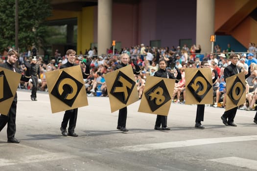 Indianapolis, Indiana, USA - May 26, 2018, Members of the black and gold marching band   at the Indy 500 Parade