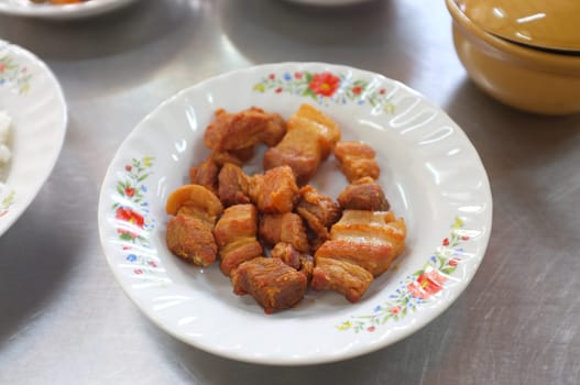 Deep fried pork belly with fish sauce , Thai food