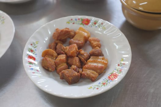 Deep fried pork belly with fish sauce , Thai food
