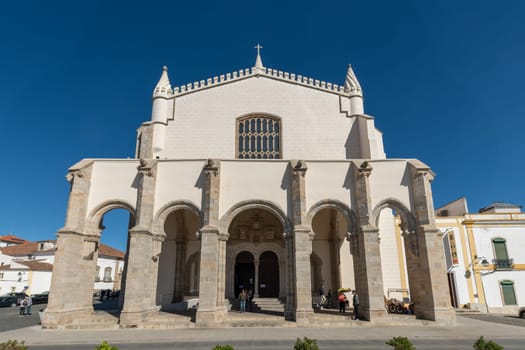 EVORA, PORTUGAL - CIRCA MARCH 2019: Facade of the church of St. Francis or Chapel of the Bones. Gothic style with some Manueline influences.