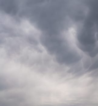 Dark and dramatic stormy rainy clouds overlay background