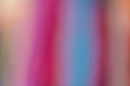 Defocused and blurred abstract colorful background of mixed colors