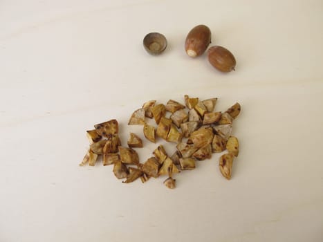 Roasted acorns on wooden board