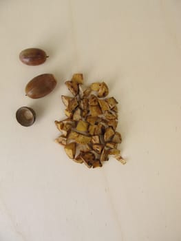 Roasted acorns on wooden board
