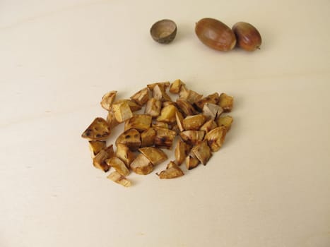 Roasted acorns on wooden board